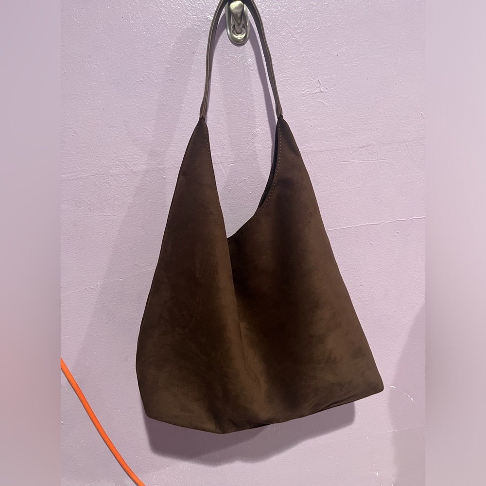 Brown bag cute for outside running around or going out .